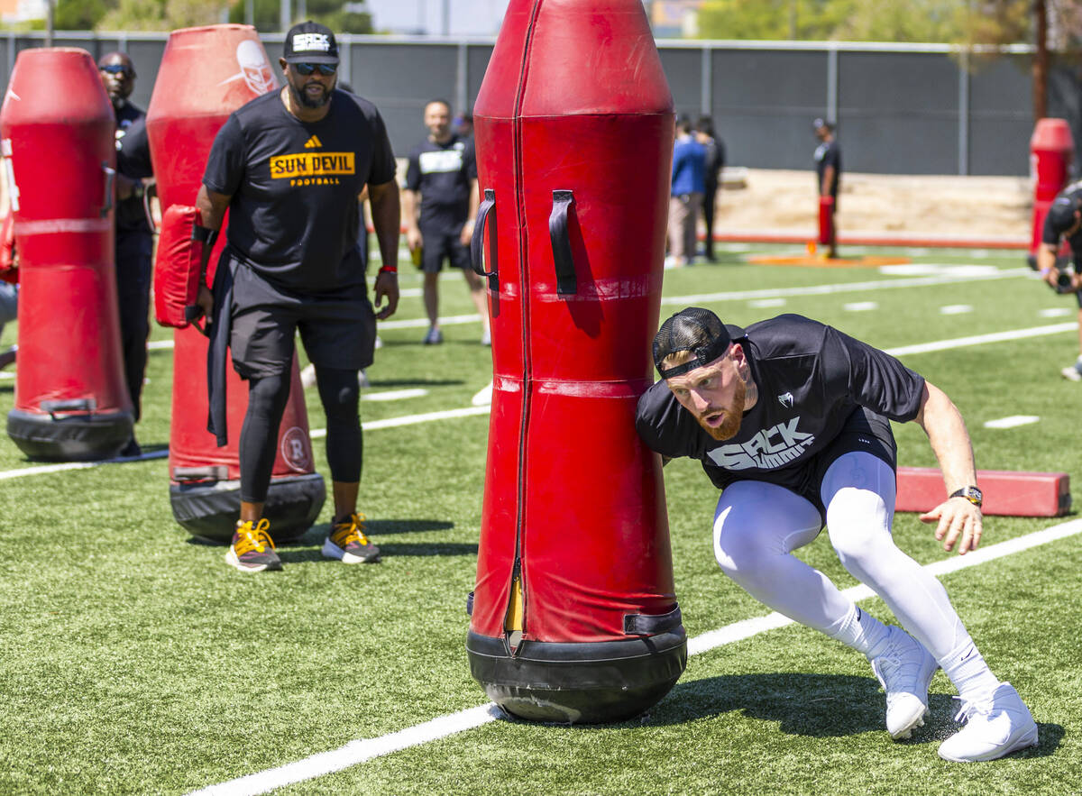 Raiders defensive end Maxx Crosby runs through a drill during Sack Summit 2025 at the UNLV Fert ...