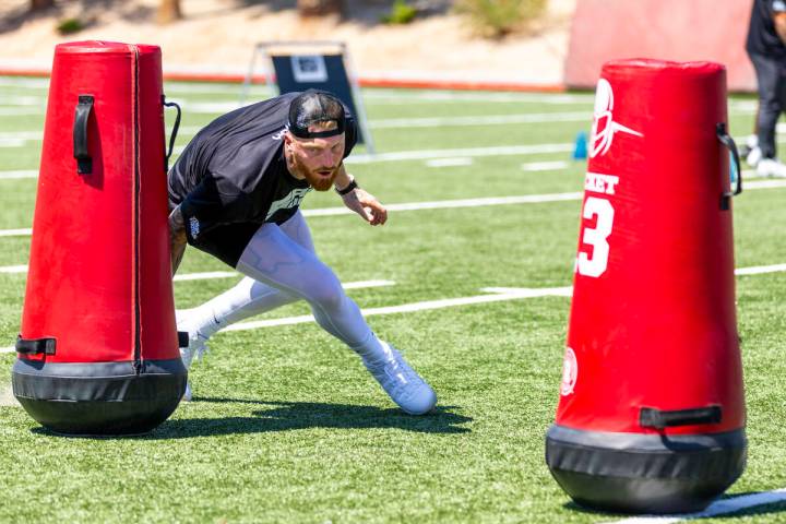 Raiders defensive end Maxx Crosby runs through a drill during Sack Summit 2025 at the UNLV Fert ...