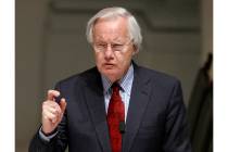 FILE - Bill Moyers speaks during the wake for R. Sargent Shriver in Washington on Jan. 21, 2011 ...