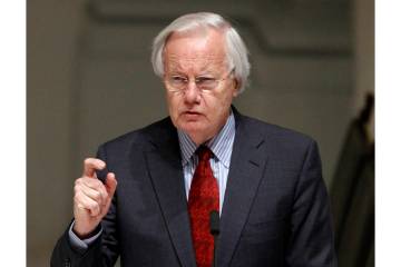 FILE - Bill Moyers speaks during the wake for R. Sargent Shriver in Washington on Jan. 21, 2011 ...