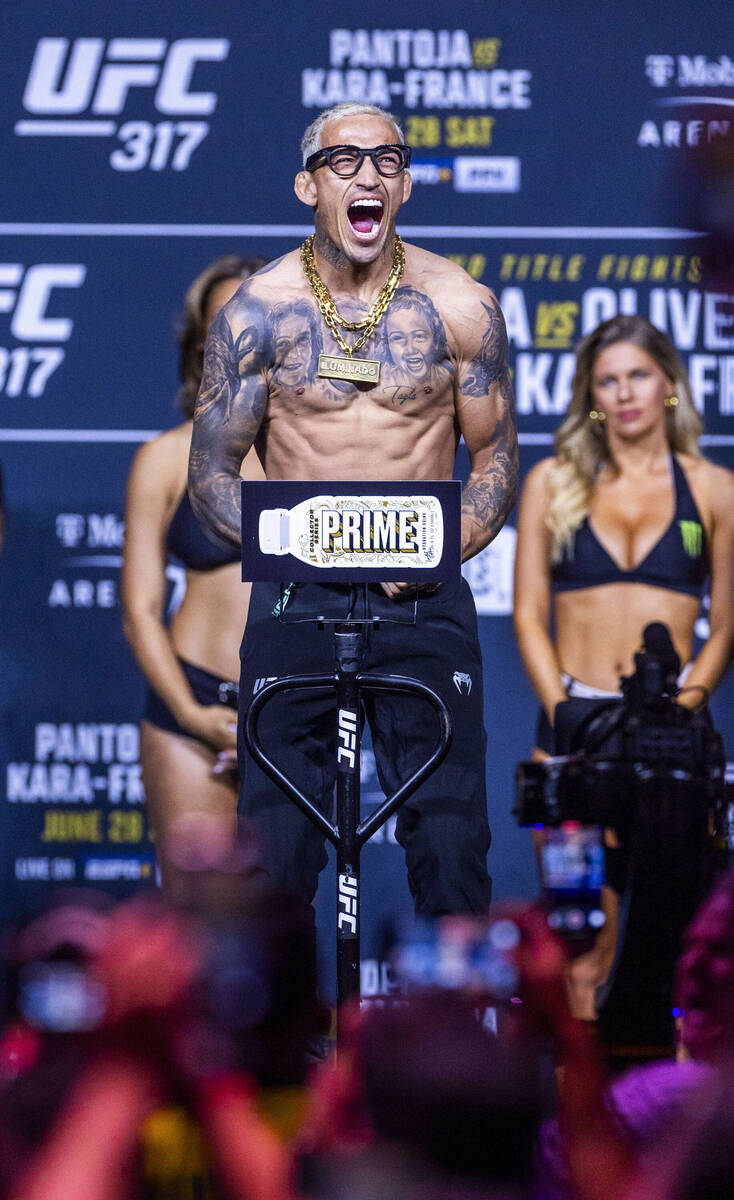 Fighter Charles Oliveira poses during weigh-ins for UFC 317 at T-Mobile Arena on Friday, June 2 ...