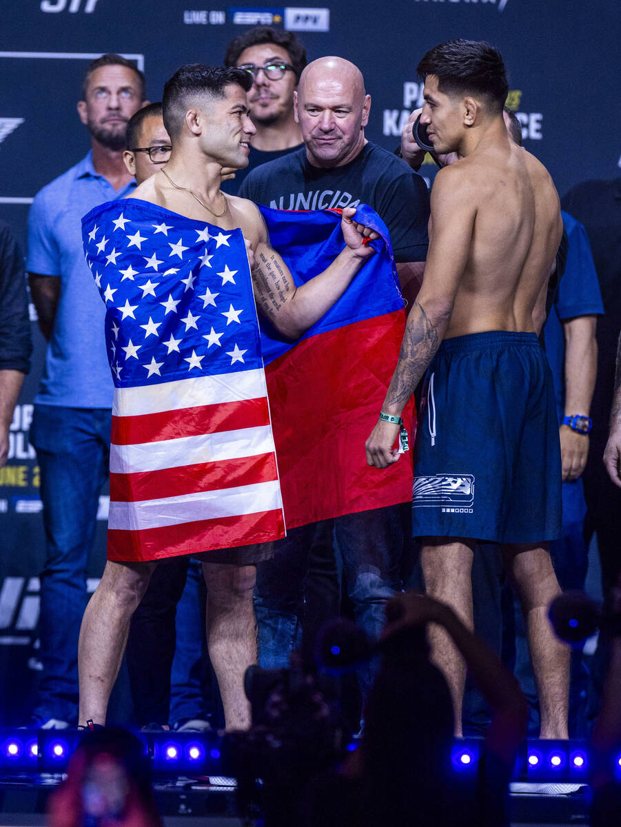 Fighters Hyder Amil and Jose Miguel Delgado face off during weigh-ins for UFC 317 at T-Mobile A ...
