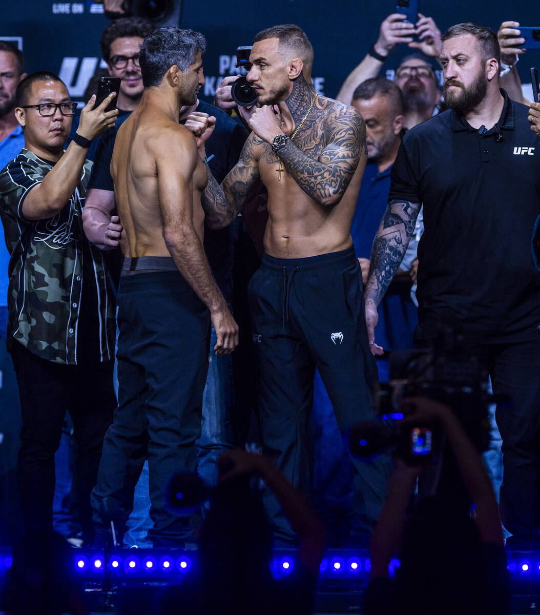 Fighter Beneil Dariush and Renato Moicano face off during weigh-ins for UFC 317 at T-Mobile Are ...