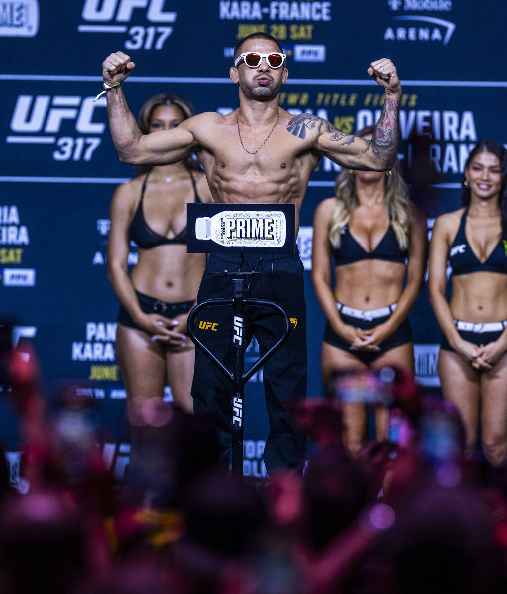 Fighter Alexandre Pantoja poses during weigh-ins for UFC 317 at T-Mobile Arena on Friday, June ...