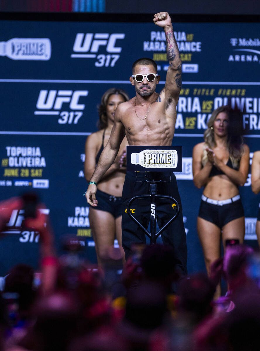 Fighter Alexandre Pantoja poses during weigh-ins for UFC 317 at T-Mobile Arena on Friday, June ...
