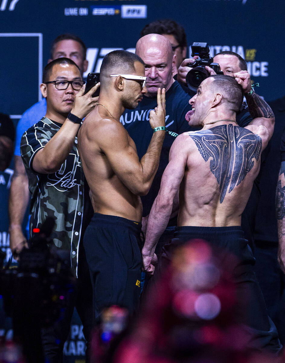 Fighter Alexandre Pantoja, left, and Kai Kara-France face off during weigh-ins for UFC 317 at T ...