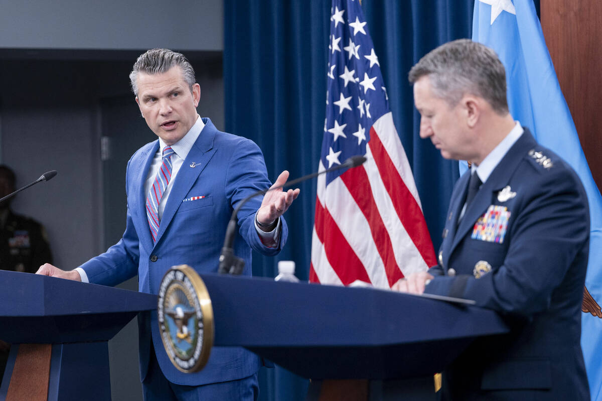 Defense Secretary Pete Hegseth, left, speaks at a news conference with Joint Chiefs Chairman Ge ...