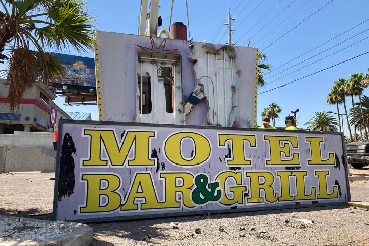 A damaged sign at the long-shuttered Laughing Jackalope tavern on the Las Vegas Strip was being ...