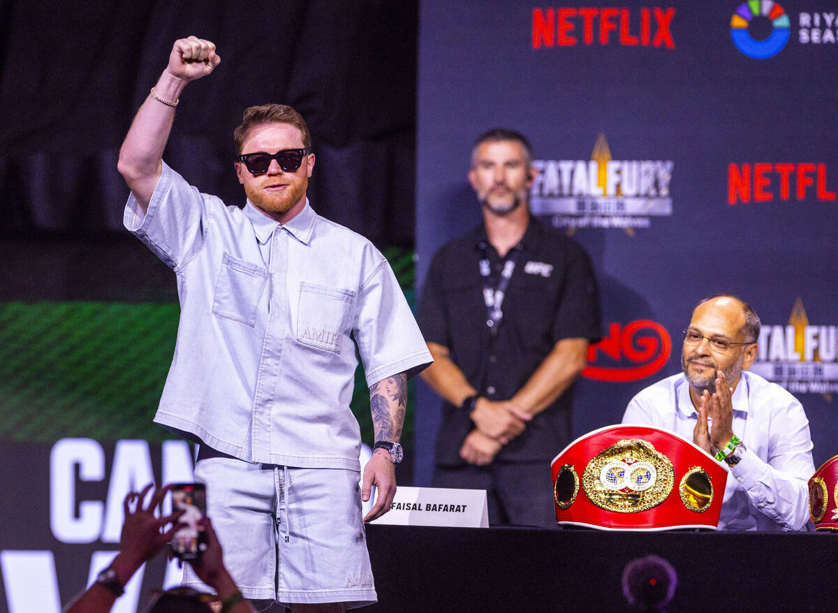 Canelo Alvarez takes the stage during a press conference for a boxing match between Terence Cra ...