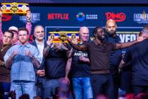 Canelo Alvarez and Terence Crawford pose off for fans during a press conference for their upcom ...