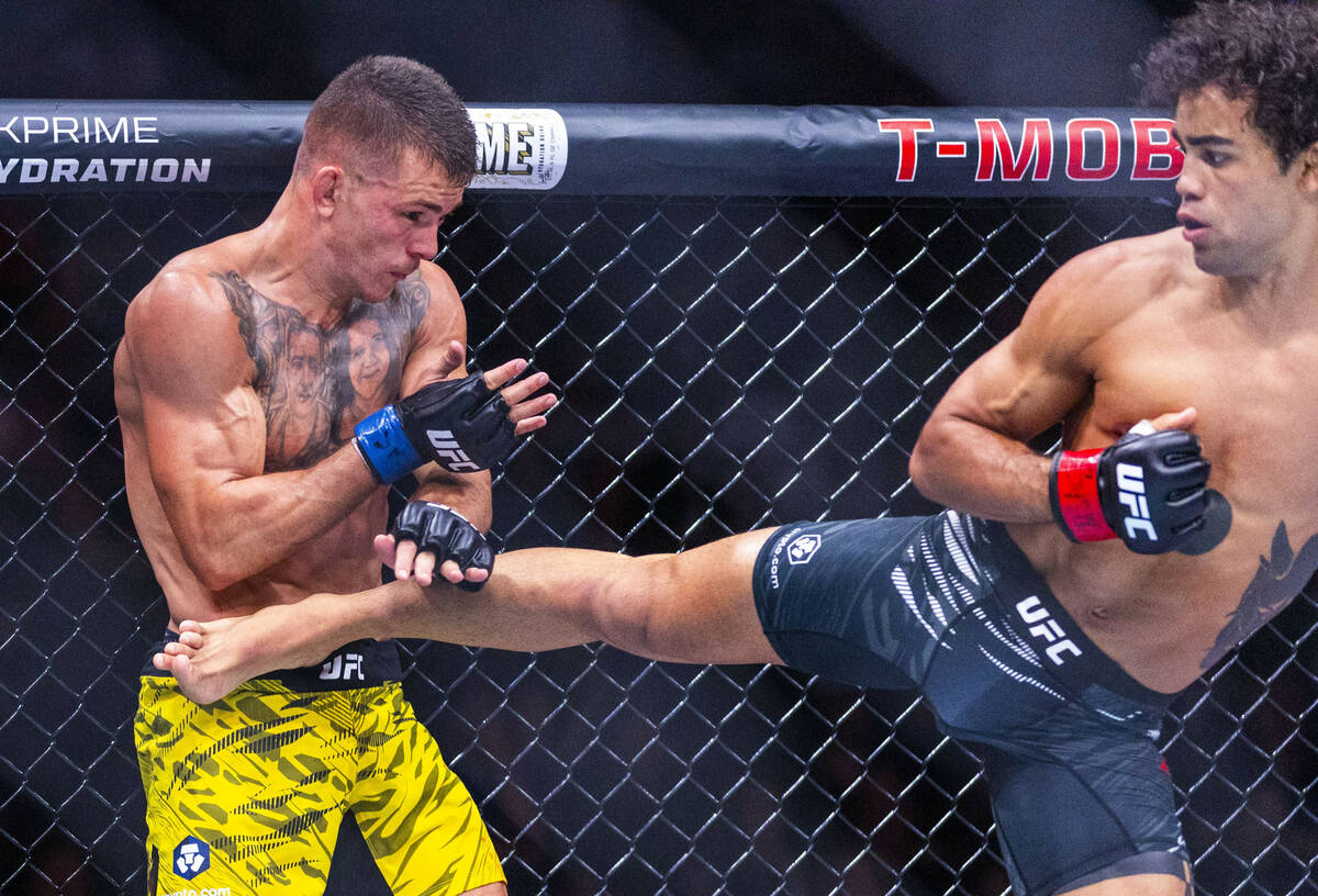 Felipe Lima takes a kick by Payton Talbott during their bantamweight fight in UFC 317 at T-Mobi ...