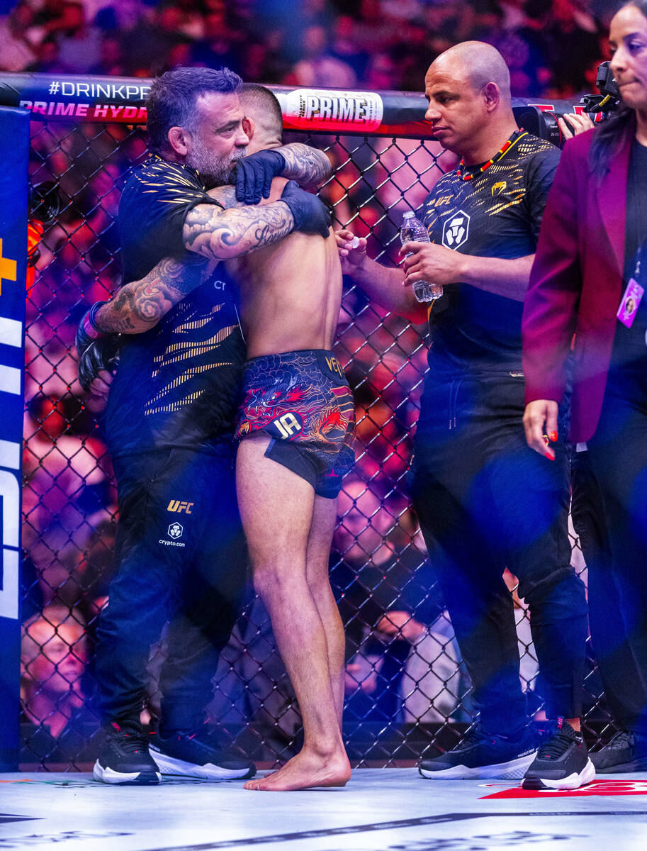 Alexandre Pantoja is hugged as he celebrates his submission of Kai Kara-France during their fly ...