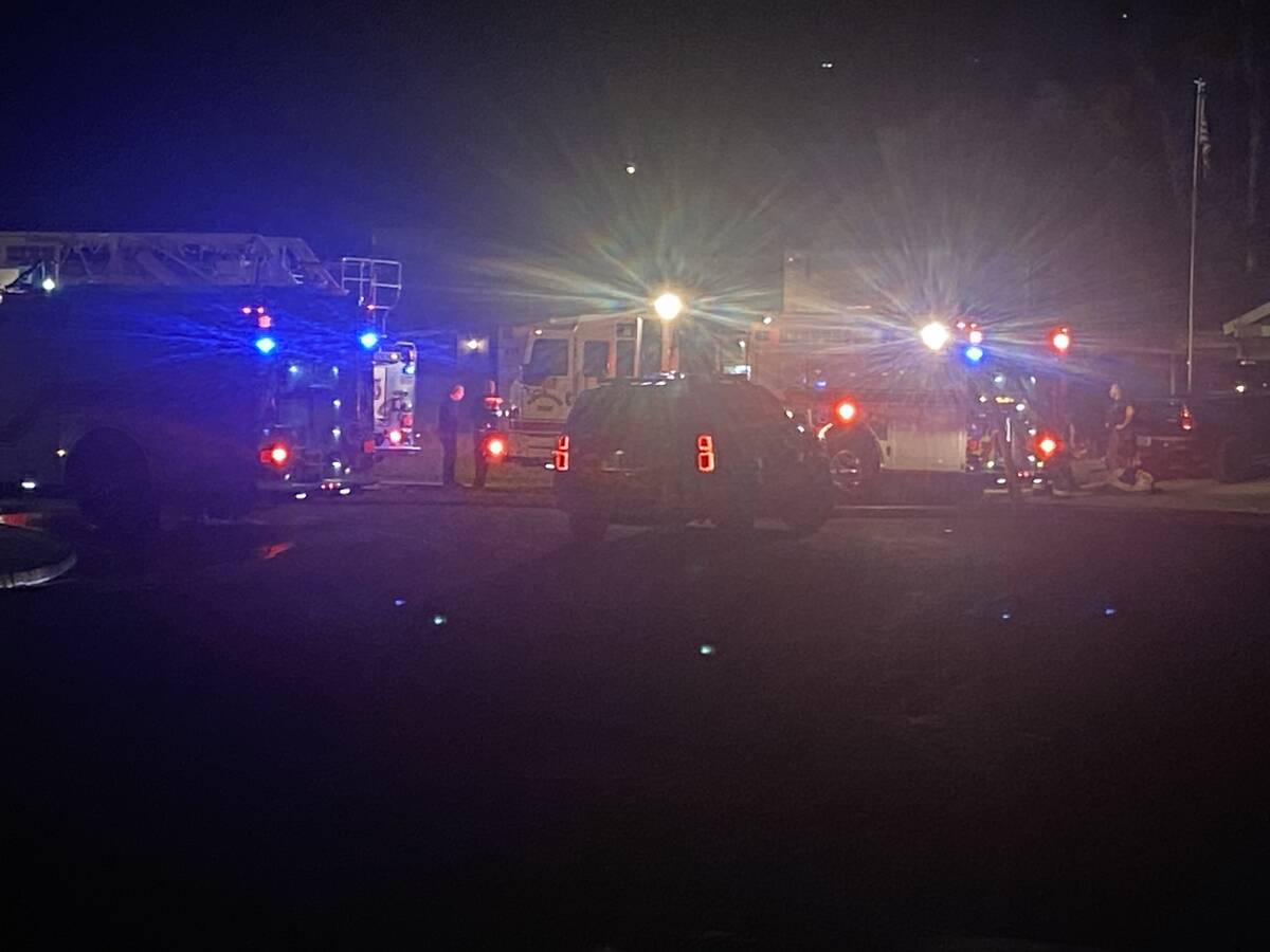 Henderson Fire Department vehicles were stationed outside the scene of a fire in the 600 block ...