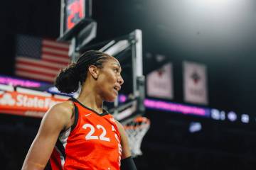 Aces center A'ja Wilson walks to the free throw line during a WNBA game between the Aces and Wa ...