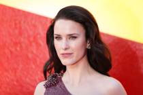 Rachel Brosnahan poses for photographers upon arrival at a fan screening of Superman, on Wednes ...