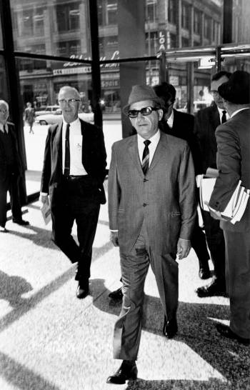 Sam Giancana, organized crime boss known as "Momo," walks into a federal building in ...