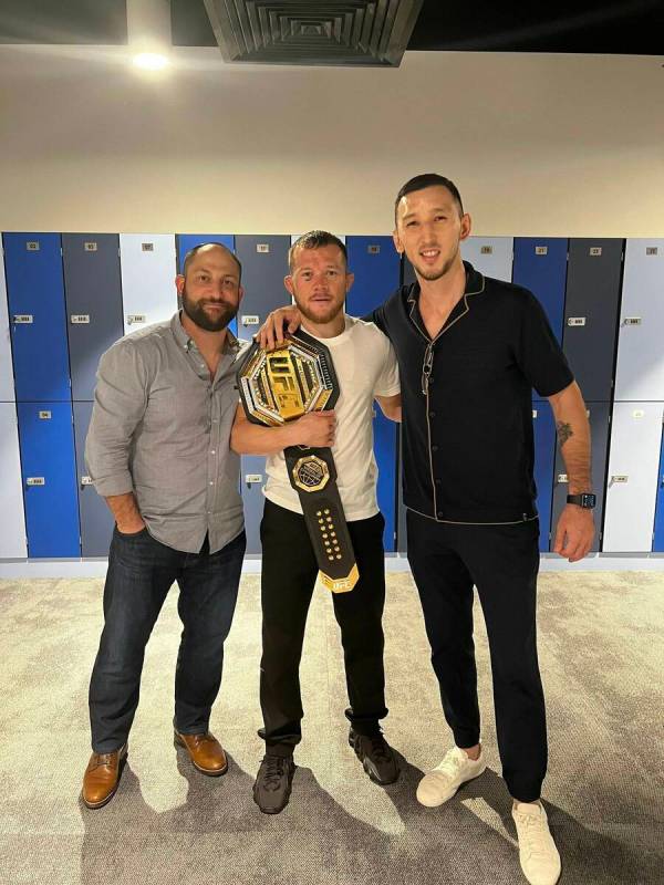 Daniel Rubenstein (left), Petr Yan and Ruby Sports & Entertainment agent Sayat Abdrakhmanov. (R ...