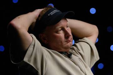 Steve Dannenmann of Severn, Md., looks across the table before betting $5 million in chips on t ...