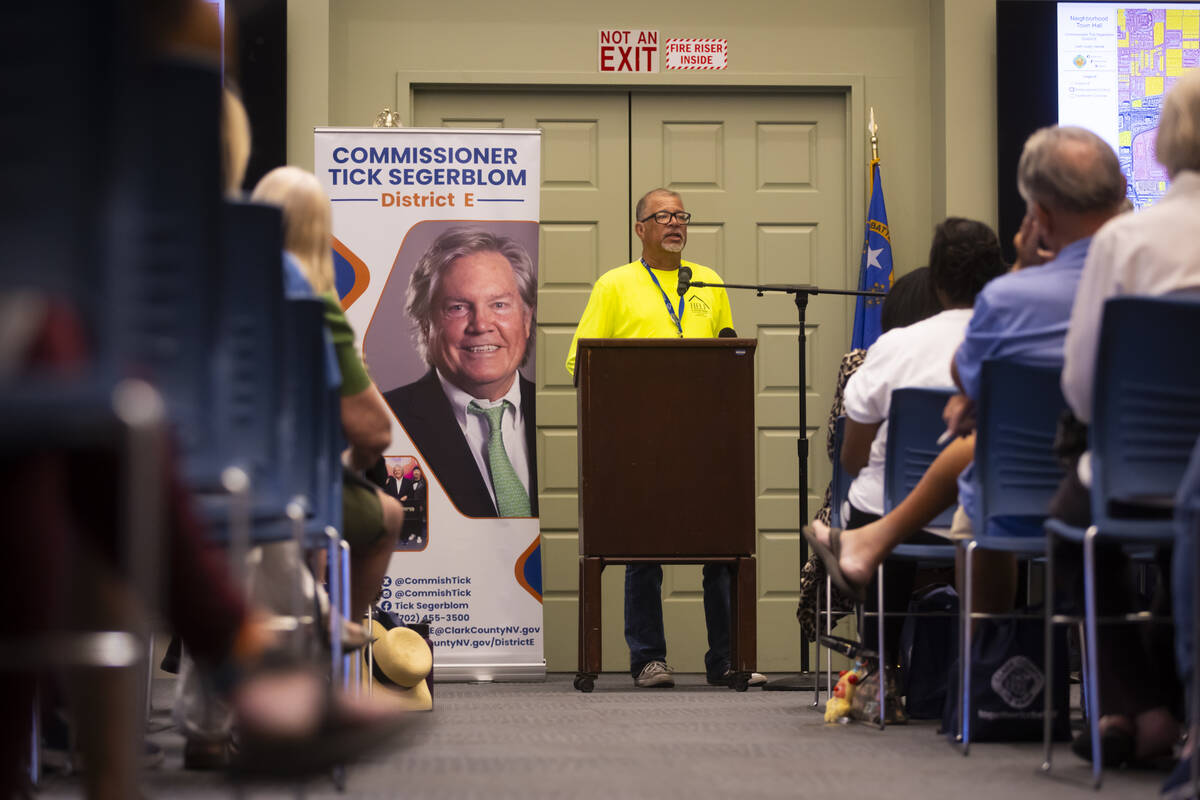 Louis Lacey, director of the crisis team for Help of Southern Nevada, speaks during a community ...