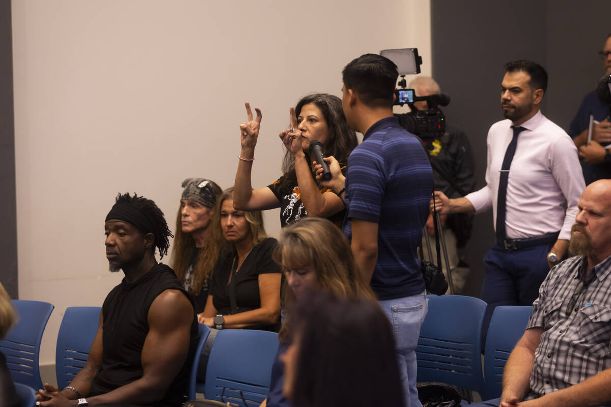 A resident of the Paradise Palms neighborhood speaks during a community town hall at the Clark ...