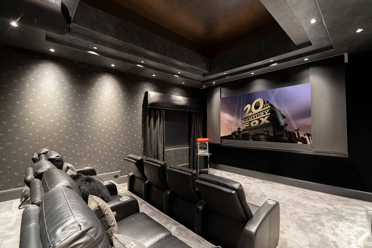 This luxury home features many amenities, such as a home theater. (Stetson Ybarra for huntingto ...