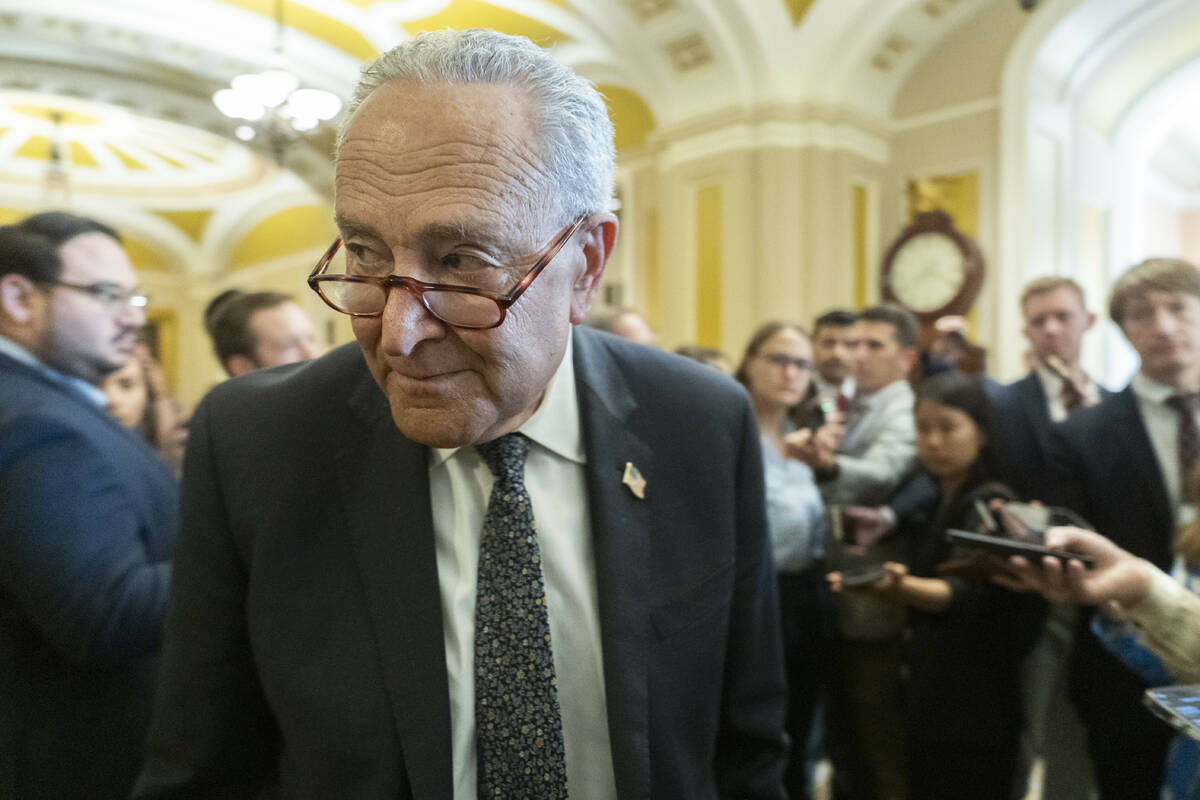 Senate Minority Leader Chuck Schumer, D-N.Y., speaks to reporters outside the Senate chamber as ...