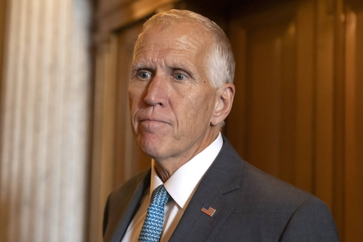 Sen. Thomas Tillis, R-N.C., speaks to reporters as Republicans begin a final push to advance Pr ...