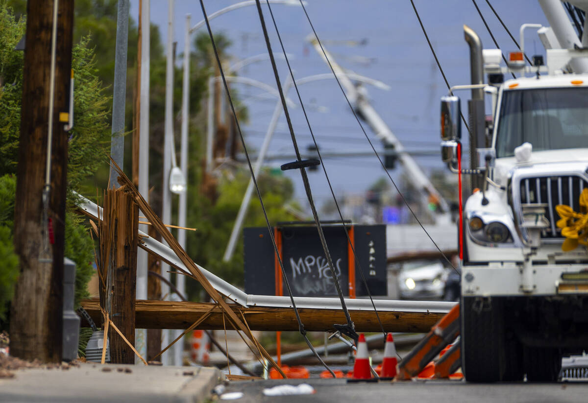 Crews continue on storm damage repair along South Jones Boulevard on Wednesday, July 2, 2025, i ...