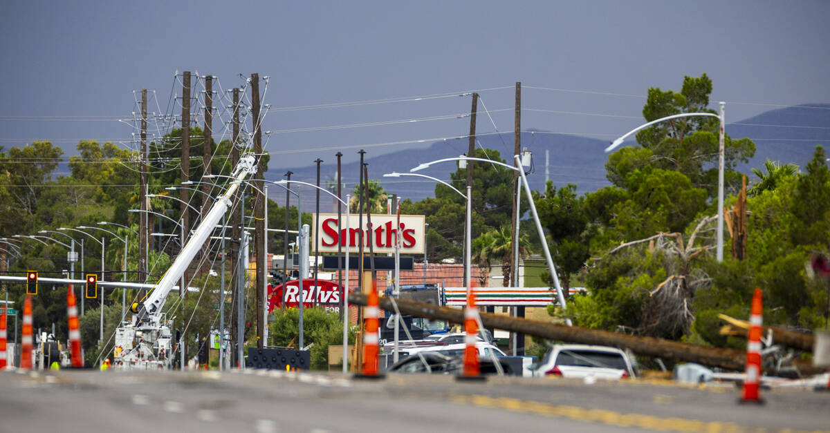 Crews continue on storm damage repair along South Jones Boulevard on Wednesday, July 2, 2025, i ...