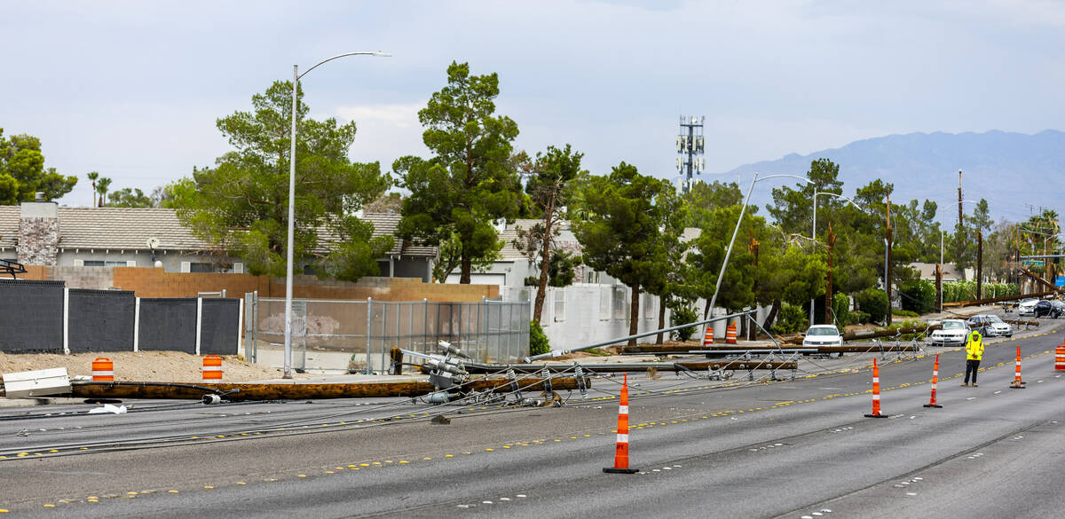 Crews continue on storm damage repair along South Jones Boulevard on Wednesday, July 2, 2025, i ...