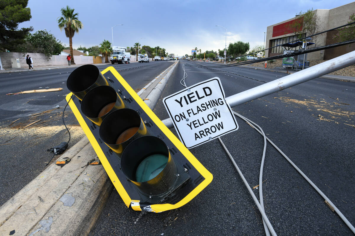 A downed traffic light is seen on Tropicana Avenue near McLeod Drive on Wednesday, July 2, 2025 ...