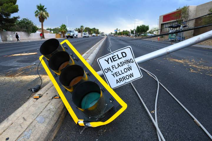 A downed traffic light is seen on Tropicana Avenue near McLeod Drive Wednesday, July 2, 2025, i ...