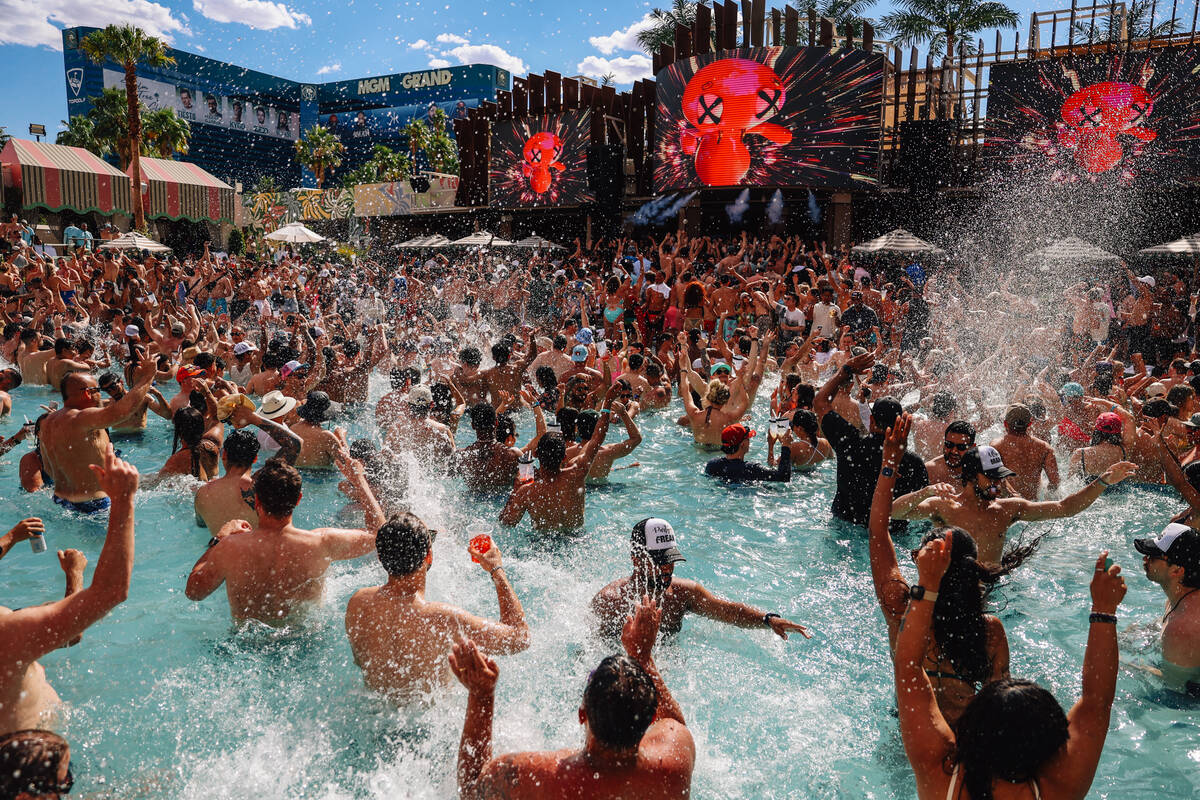 Partiers take to the pool at the Palm Tree Beach Club Saturday, May 10, 2025, in Las Vegas. (Ma ...