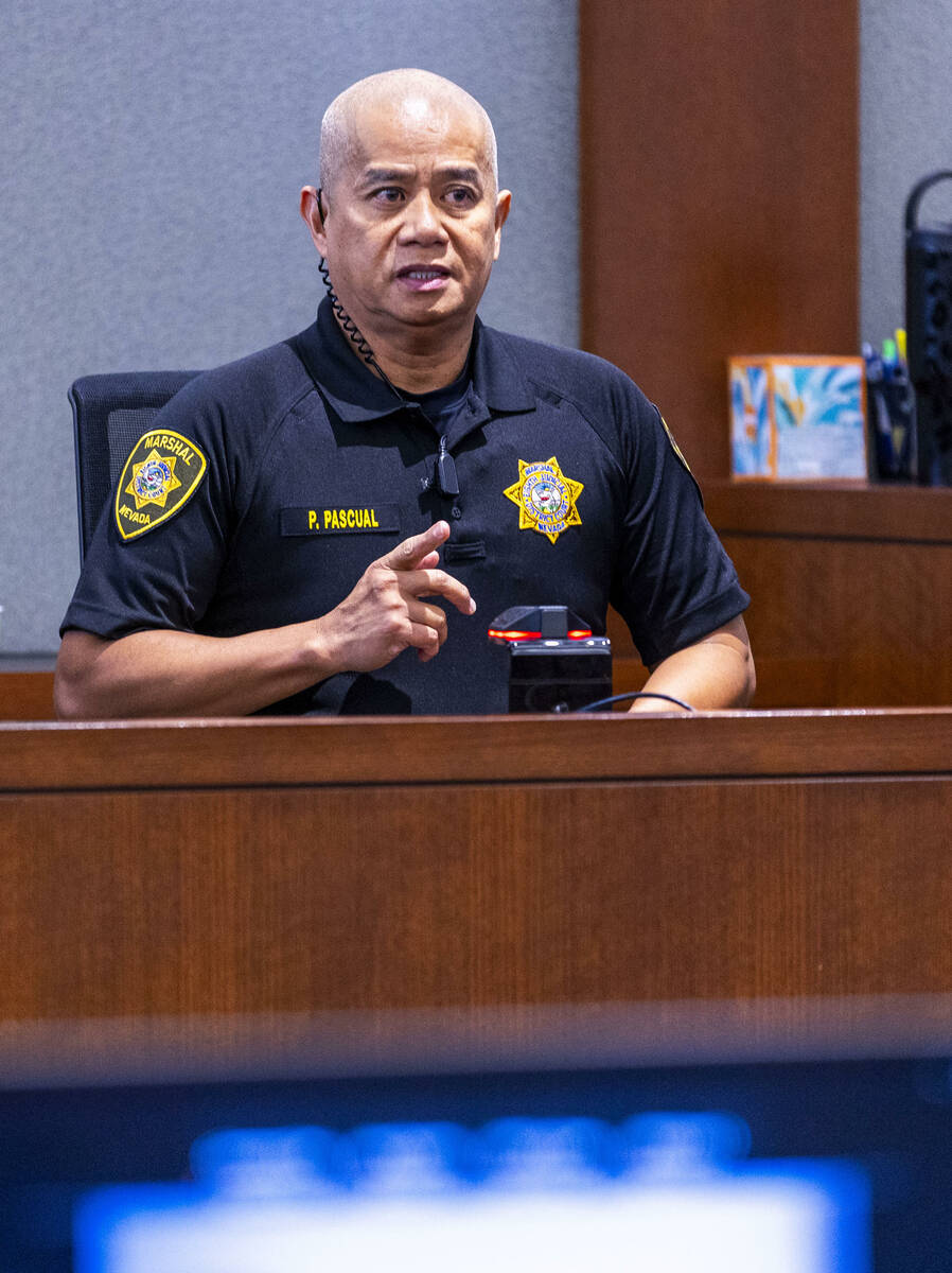 Witness Marshal Paul Pascual responds to a question from the defense attorney as the evidentiar ...