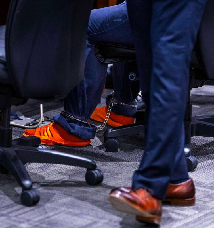 Tupac murder suspect Duane Davis wears ankle cuffs during a hearing on juror misconduct in his ...