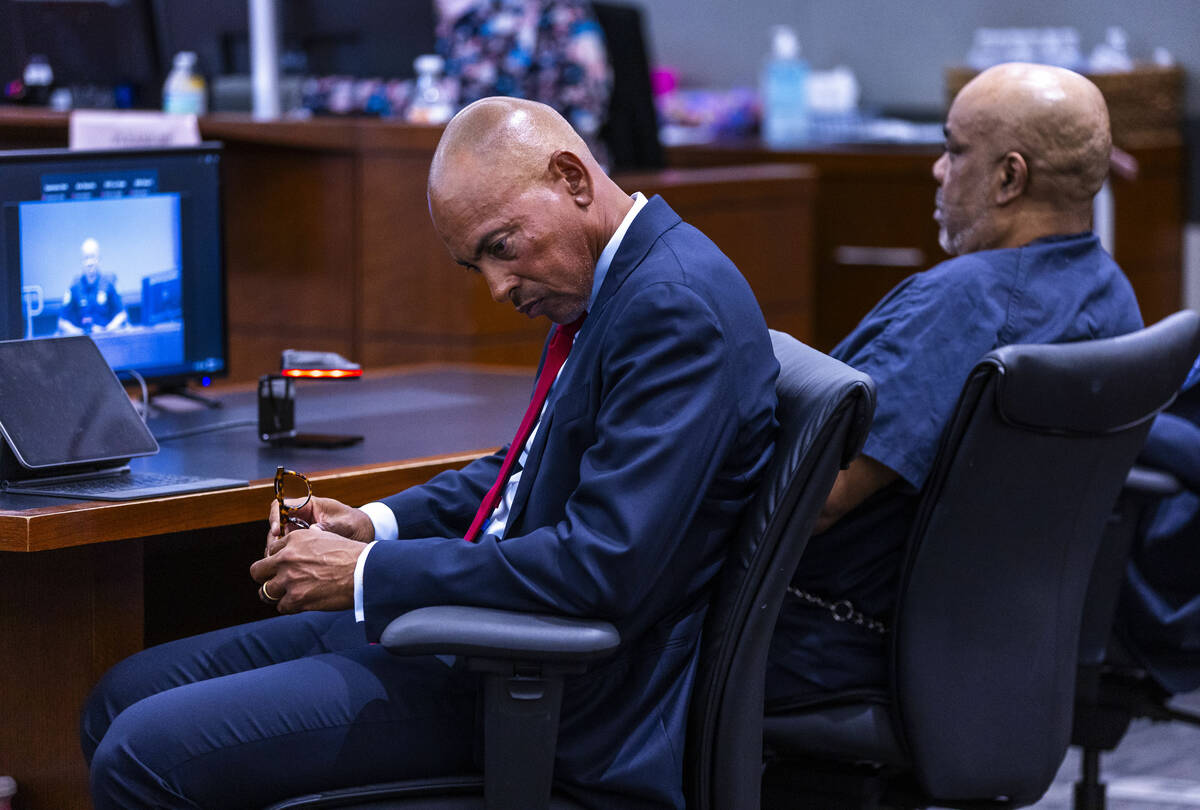 Defense attorney Carl Arnold listens as the deputy district attorney questions a witness as the ...