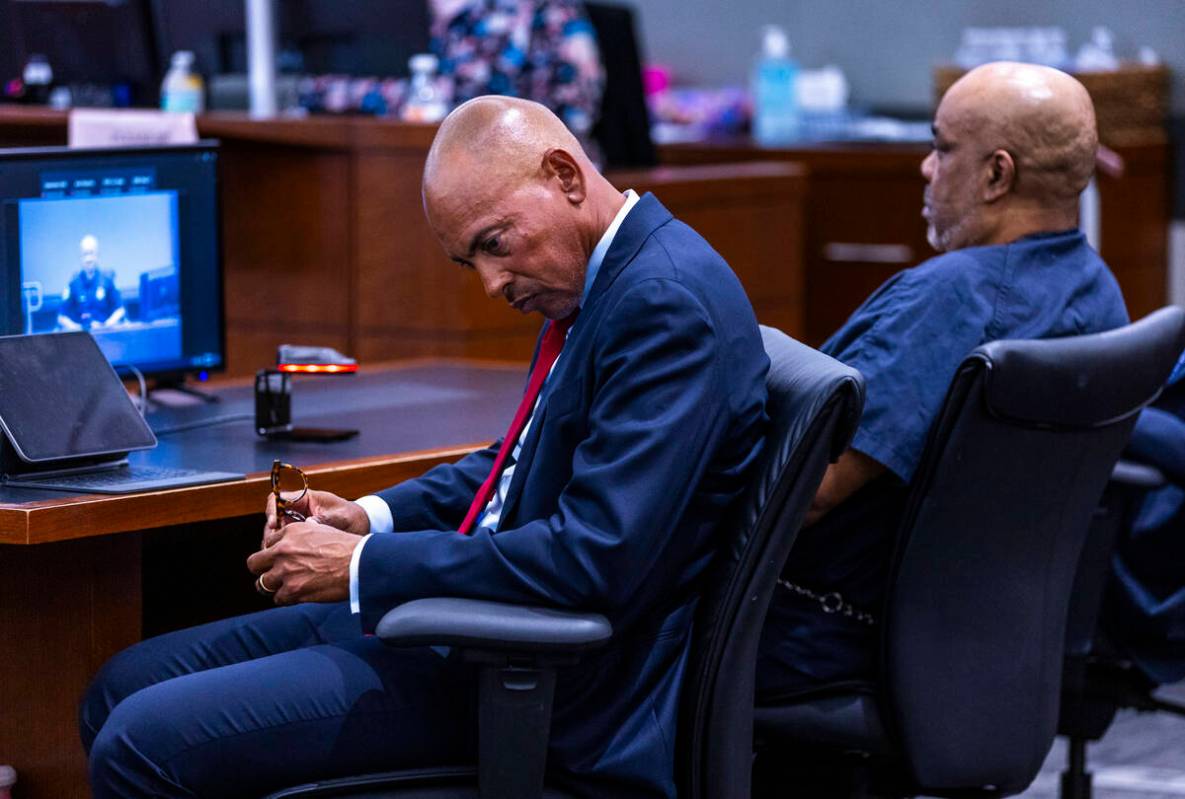 Defense attorney Carl Arnold listens as the deputy district attorney questions a witness as the ...