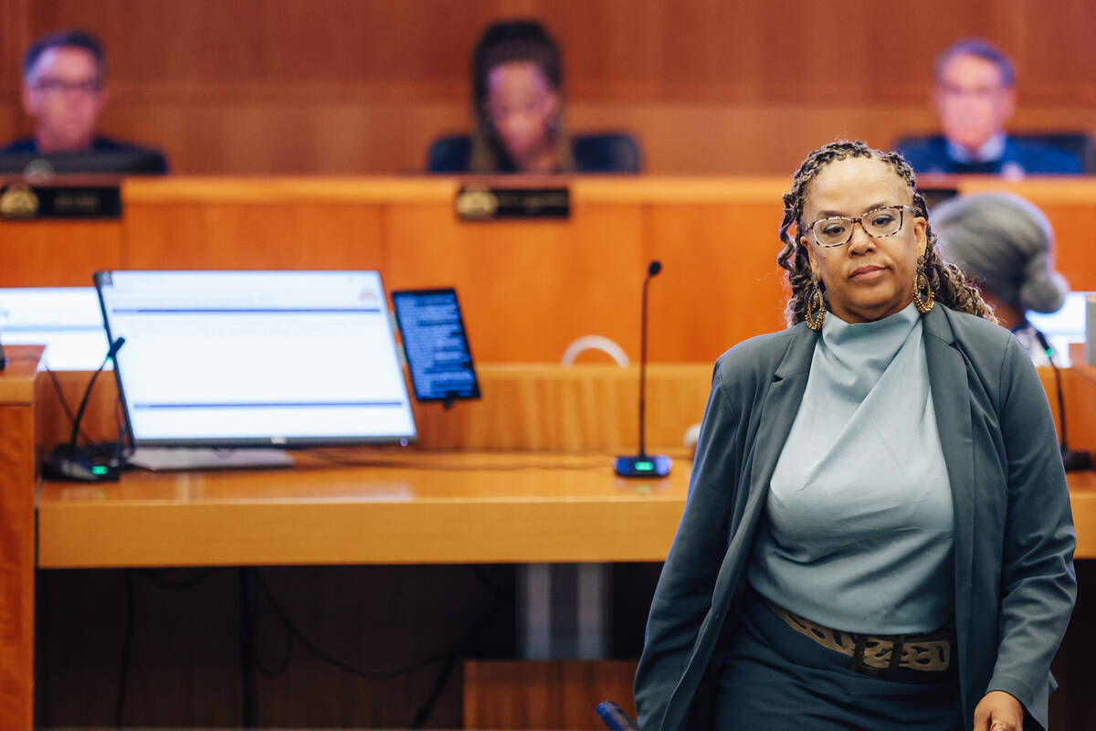 Nevada state senator Dina Neal walks off from the podium after speaking during a city council m ...