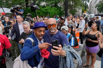 Spporters of Sean "Diddy" Combs, react outside Manhattan federal court after Combs' w ...