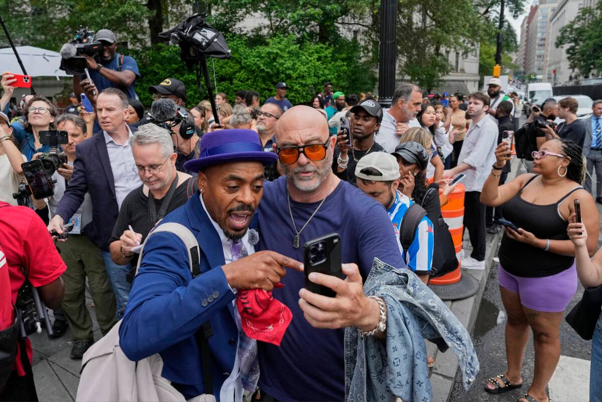 Spporters of Sean "Diddy" Combs, react outside Manhattan federal court after Combs' w ...