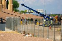 Las Vegas firefighters conduct a swift water rescue along Vegas Creek near Symphony Park Thursd ...