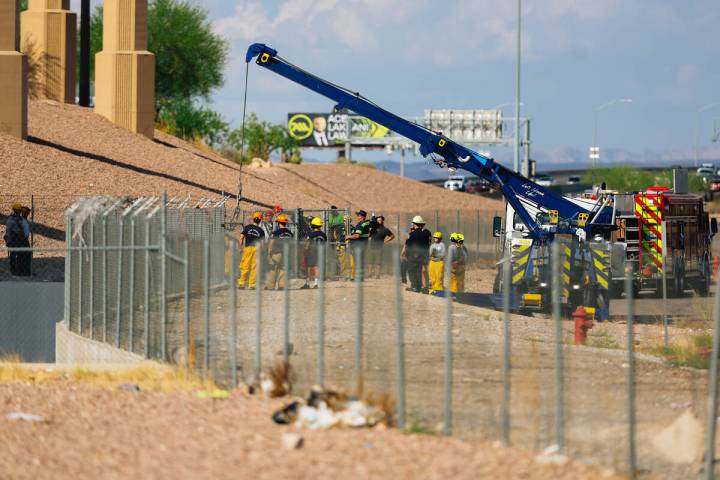 Las Vegas firefighters conduct a swift water rescue along Vegas Creek near Symphony Park Thursd ...