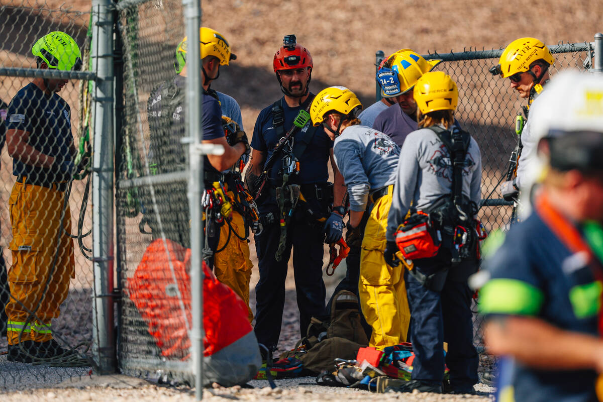 Las Vegas firefighters conduct a swift water rescue along Vegas Creek near Symphony Park Thursd ...