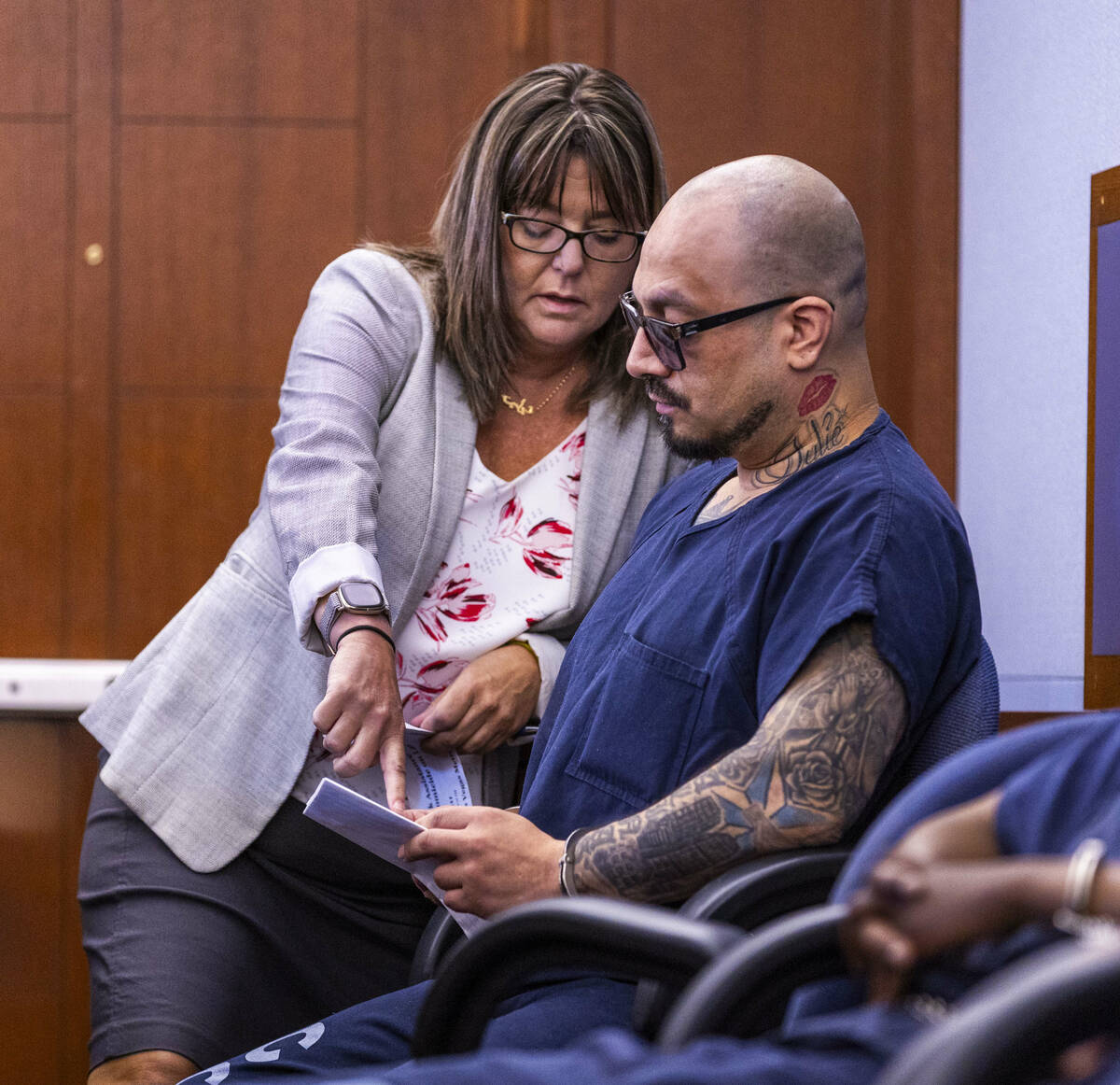 Public Defender Violet Radosta confers with Manuel Ruiz, the suspect in a livestreamed Strip sh ...