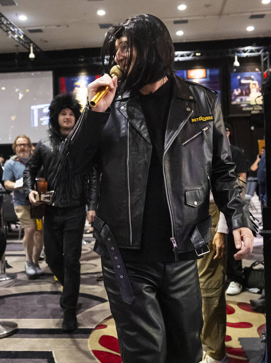 Phil Hellmuth, 17-time World Series of Poker champion, makes his grand entrance for the WSOP Ma ...