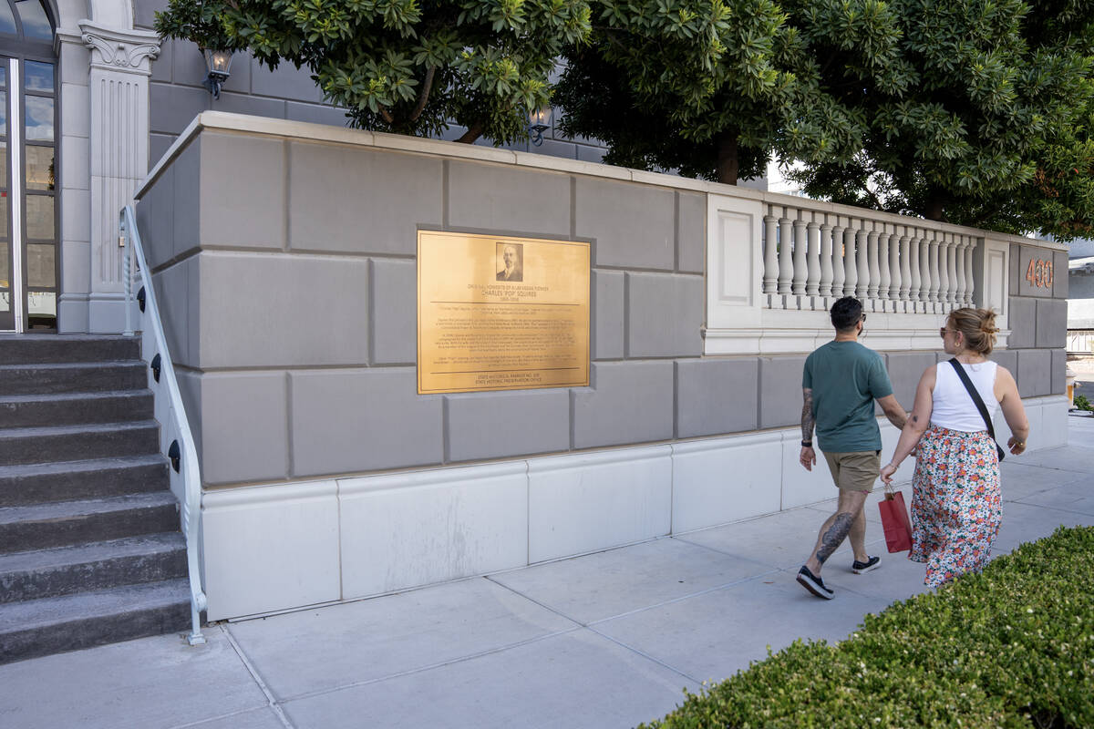 A plaque serves as a historical marker for the original home of “Pop” Squires in downtown L ...