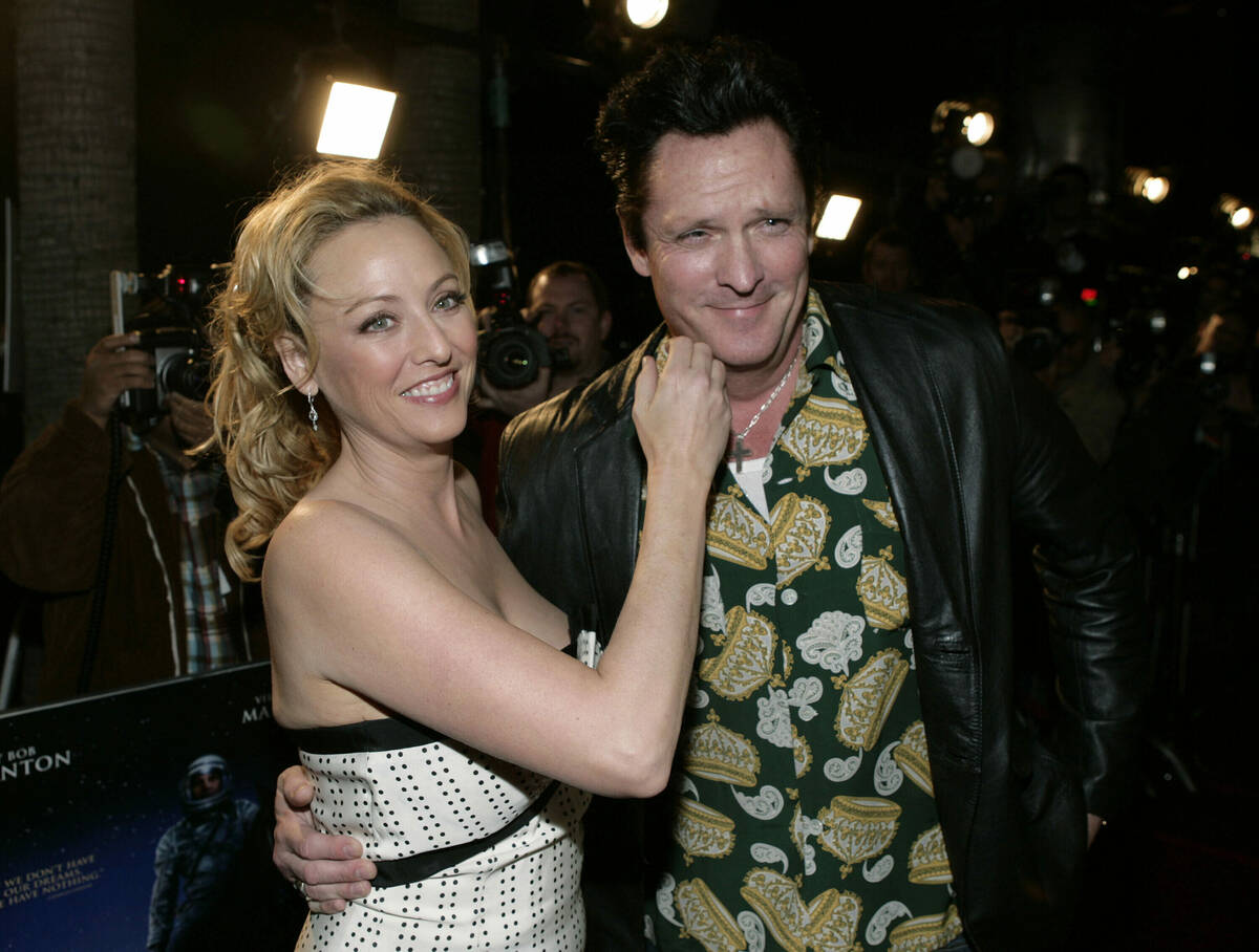 FILE - Actors Virginia Madsen, left, and her brother Michael Madsen appear at the premiere of & ...