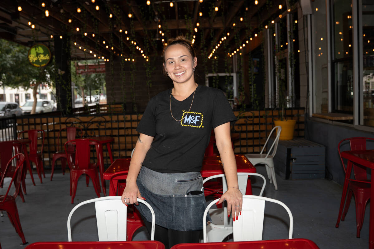Crystal Chamberlin, a waitress at Makers & Finders, works a shift in Las Vegas July 3, 2025 ...