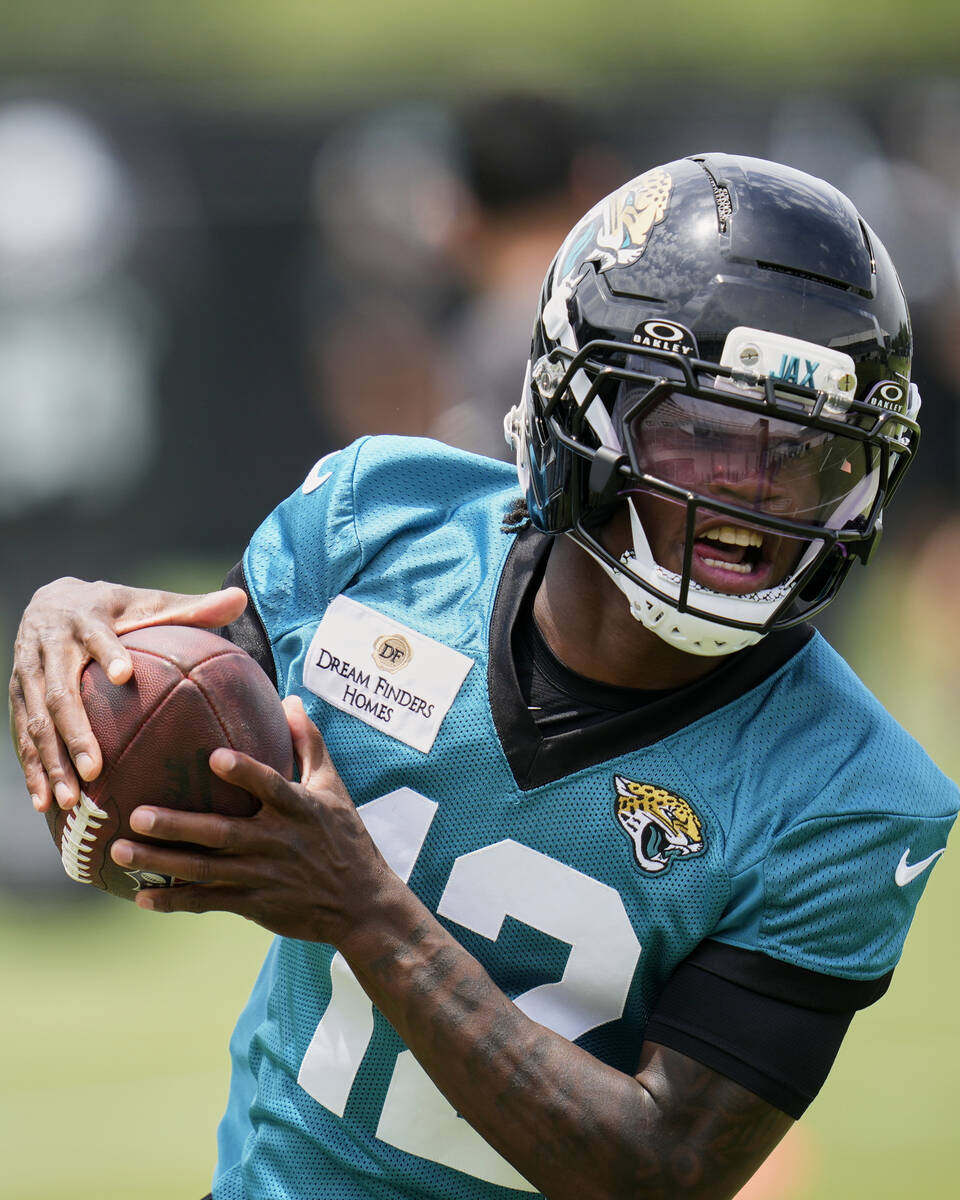 Jacksonville Jaguars wide receiver Travis Hunter makes a reception during the NFL football team ...