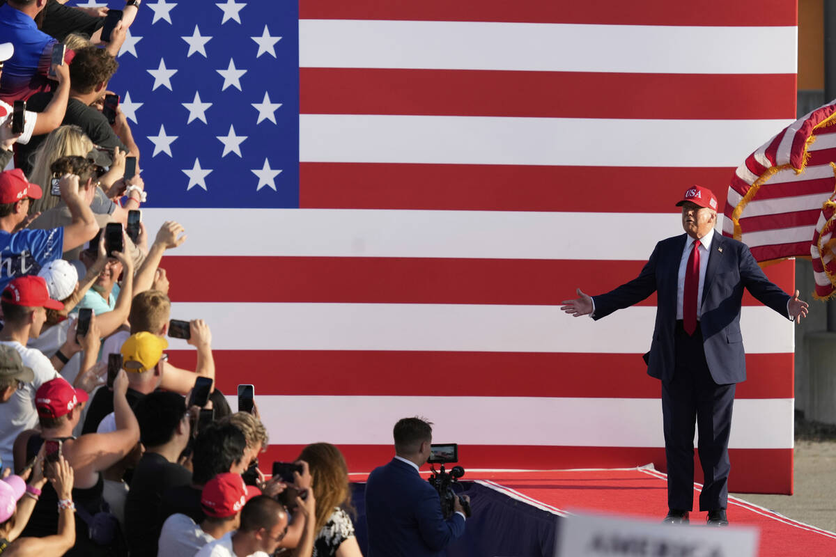 President Donald Trump arrives to speak at a rally at the Iowa State Fairgrounds, Thursday, Jul ...
